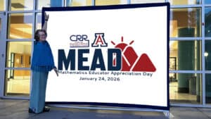 Ms Davis standing beside CRR and MEAD 2026 Conference Banner